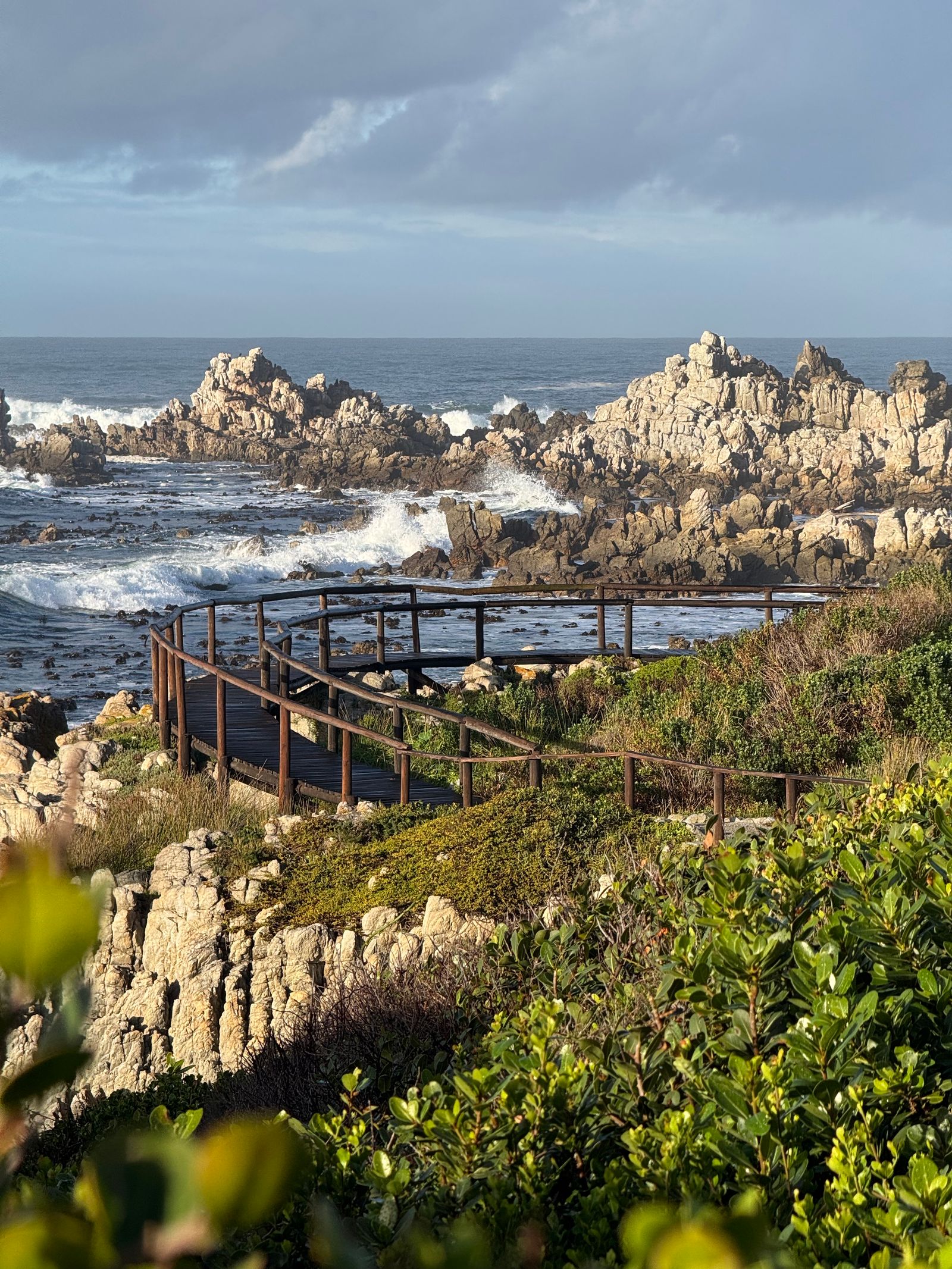 The wooden boardwalk winding towards the southern tip of Africa at Cape Agulhas